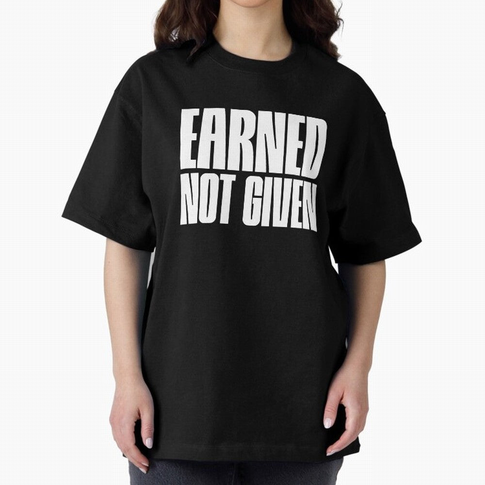 Earned not given white Oversized T-Shirt Experience the Global Stage of FIFA World Cup 2026 USA Canada Mexico Spirit, Filled with Spain and Netherlands, Messi and Cristiano Ronaldo, Supporter Pride, Iconic Celebrations, Legendary Names and Global
