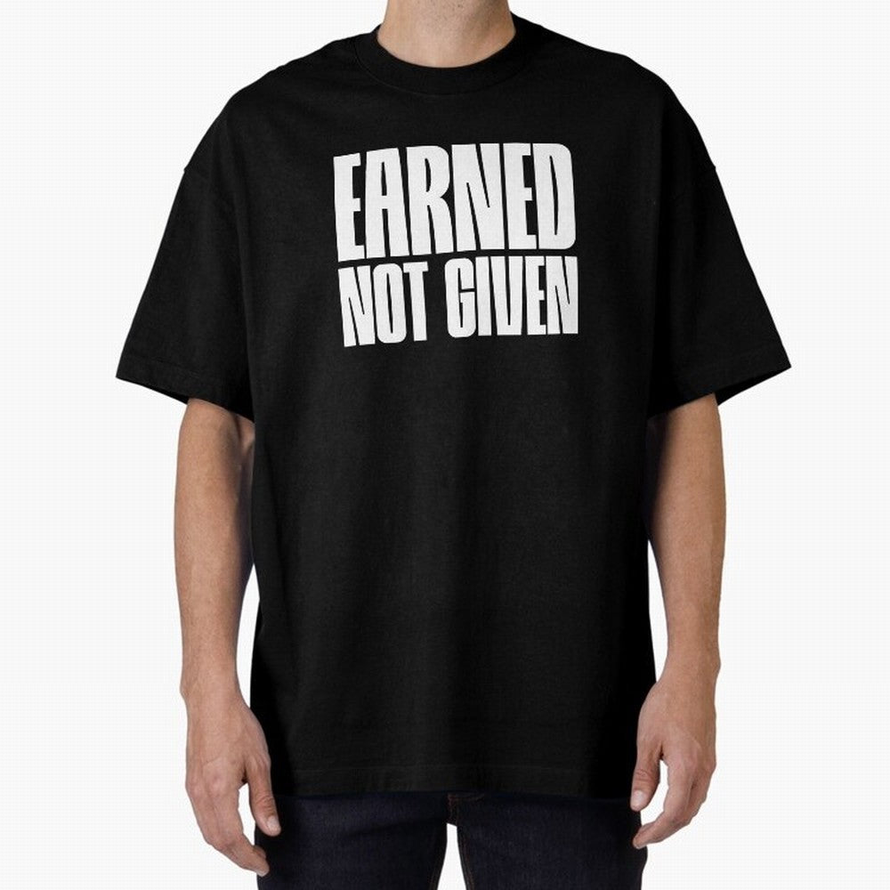 Earned not given white Oversized T-Shirt Experience the Global Stage of FIFA World Cup 2026 USA Canada Mexico Spirit, Filled with Spain and Netherlands, Messi and Cristiano Ronaldo, Supporter Pride, Iconic Celebrations, Legendary Names and Global