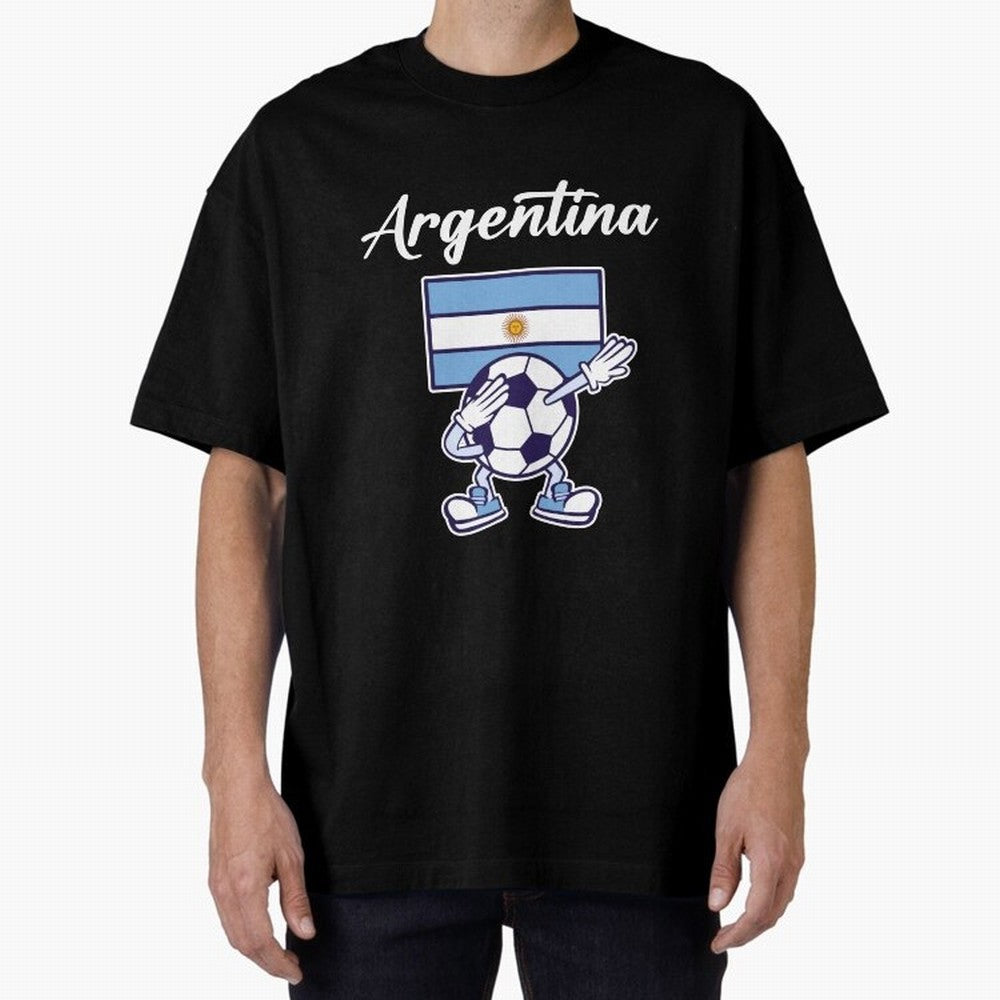ARGENTINA - Dabbing Football Soccer Ball - ARGENTINA Oversized T-Shirt Make Every Kick Count in FIFA World Cup 2026 with Cristiano Ronaldo, England and Germany Energy, Global Supporter Spirit, Legendary Goals, National Colors and Tournament